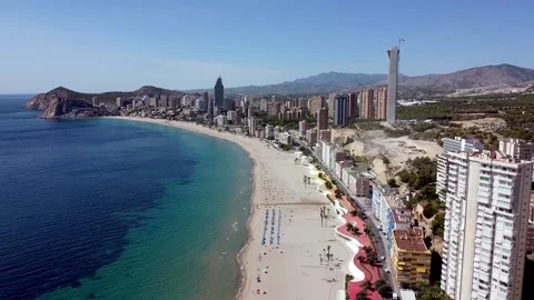 Flying downwards over Poniente beach, Benidorm. Lots of skyscrapers. Video stock 152487483