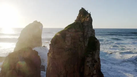 Flying drone 4K video catching sunset evening sun rays making majestic view. Bea 動画素材 306527787