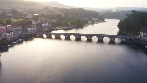 Flying drone 4K video over Ponte Medieval de Pontesampaio - Puente Sampayo Bridg Stock-Footage 310959137