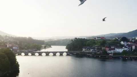Flying drone 4K video over Ponte Medieval de Pontesampaio - Puente Sampayo Bridg Video stock 332713547