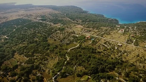 Flying with drone above beatutiful large Island Pag Stock Footage 95497503