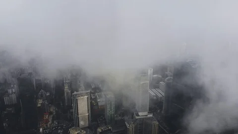 Flying drone above the clouds in Guangzhou Stock Footage 113160637