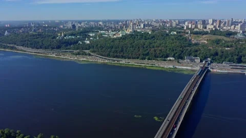 Flying a drone above the Dnepr river with a view to Pecherskaya Lavra.   Top  Stock Footage 198378249