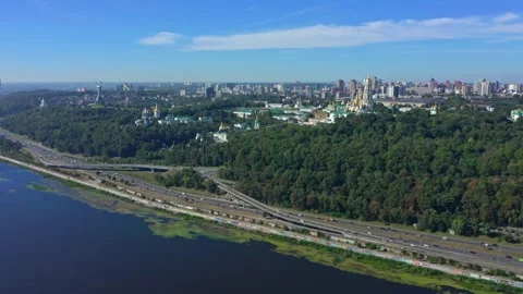 Flying a drone above the Dnepr river direct to Pecherskaya Lavra and Mother.. Stock Footage 266941784