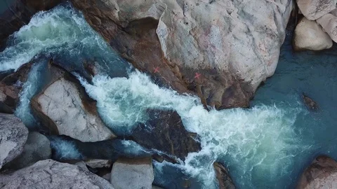 Flying on the drone above the wild waterfall in tropical palm forest. Beautiful 動画素材 112655717