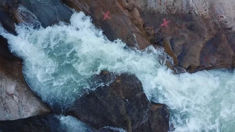 Flying on the drone above the wild waterfall in tropical palm forest. Beautiful 動画素材 112656003