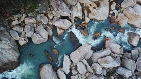 Flying on the drone above the wild waterfall in tropical palm forest. Beautiful 動画素材 112656047
