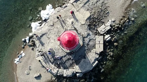 Flying on a drone around the lighthouse Stock Footage 179365012