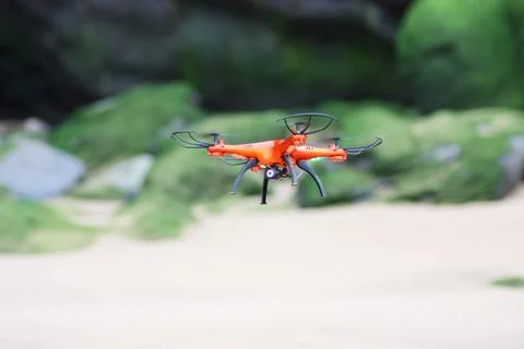 Flying drone on the beach Stock Photos