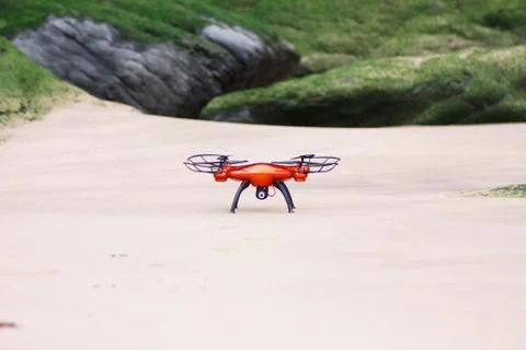 Flying drone on the beach Stock Photos