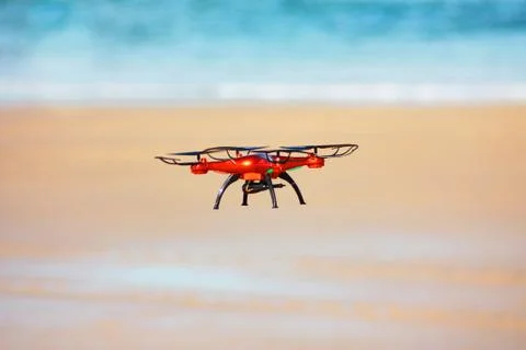 Flying drone on the beach Stock Photos