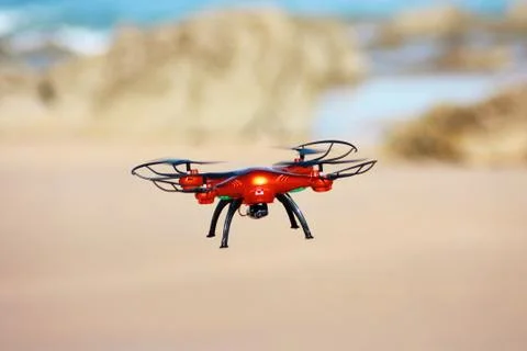 Flying drone on the beach Stock Photos