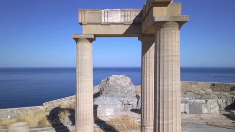Flying by drone between the columns of the acropolis in Greece with a view of th Stock Footage 158515332