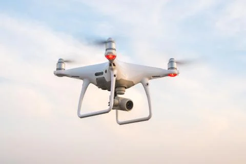 Flying drone with blue sky background Stock-Fotos