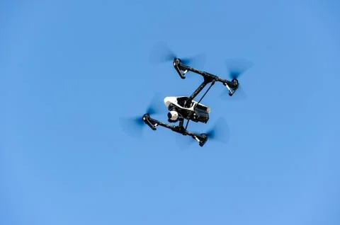 Flying drone with camera Stock Photos