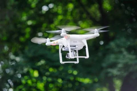 Flying drone with camera Stock Photos