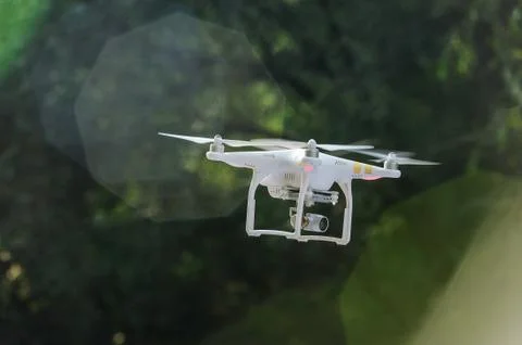 Flying drone with camera Foto stock