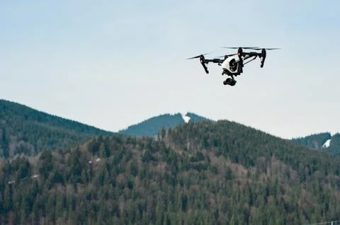 Flying drone with camera Stock Photos