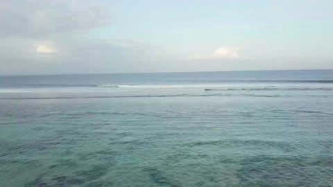 A flying drone captures the turquoise blue sea in Indonesia. Stock Footage 155971296