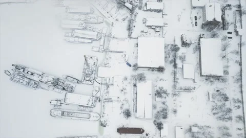 Flying on a drone directly above the shipyard and the stand where the ships are Stock Footage 166889359