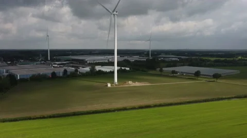 Flying with drone to electric windmill Stock Footage 196255094