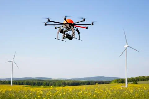 Flying drone in field 库存照片