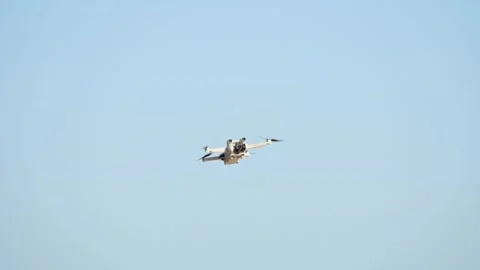 A flying drone is filming Stock Footage 258099736
