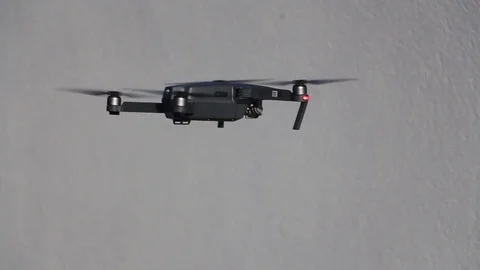 A flying drone Stock Footage 83847735