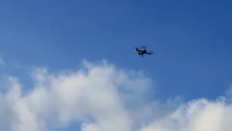 Flying a drone near a building, taking off a drone Stock Footage 260895501
