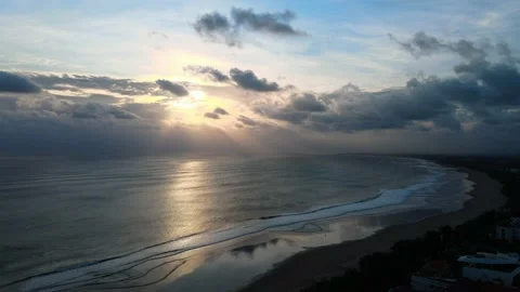 Flying Drone Of Ocean Waves Crushing On Beach Landscape on The Sunset on Bali Stock Footage 133629857