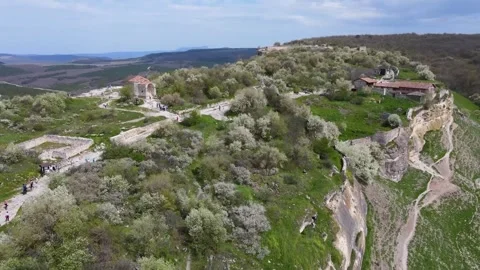 Flying a drone over an ancient cave city. Stock Footage 254167861