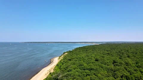 Flying a drone over a beautiful beach on the East Cost on a summer day, Stock Footage 134578740