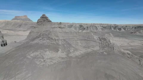 Flying drone over beautiful blue shale desert Stock Footage 165567909