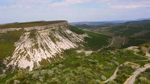 Flying a drone over the cave old city and its buildings. Stock Footage 254051154