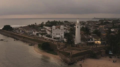 Flying a drone over the coast and Islands on the ocean at dawn. Big wave. Sunny  Stock Footage 104857738