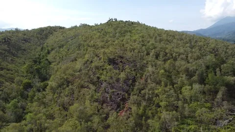 Flying Drone over Crest of Hill Stock Footage 169131844