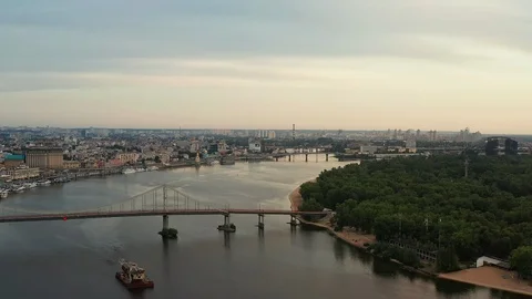 Flying a drone over the Dnieper in Kiev with a view of the capital Stock Footage 117166319