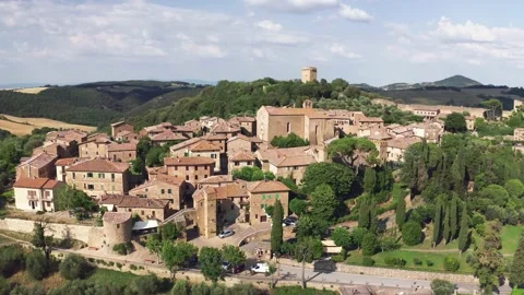 Flying a drone over an enchanted town in Tuscany, Monticchiello near Pienza Stock Footage 172142556
