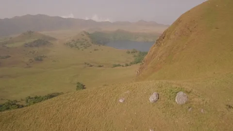 Flying a drone over the hill in the Melong lake region, Cameroon Stock Footage 260812160