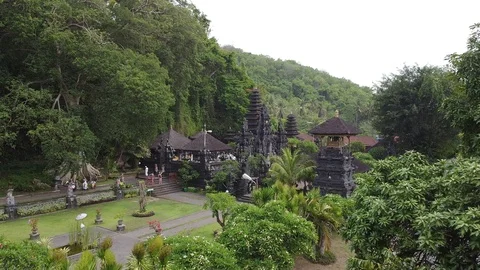 Flying with Drone over the hindu Goa Lawah Temple on island Bali Video stock 124784997