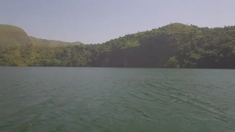 Flying a drone over a lake in the Melong region, Cameroon Stock Footage 260907091