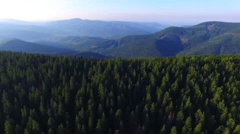 Flying drone over a mountain ridge at sunset Video stock 67095486