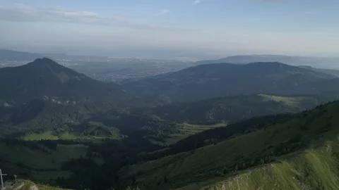 Flying a drone over a mountain ridge Stock Footage 266913625