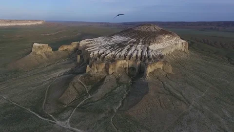 Flying a drone over the mountain Sherkala. Sunset 스톡 동영상 81865744