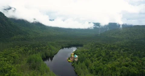 Flying drone over mountains and lakes in Canada Stock Footage 204091173