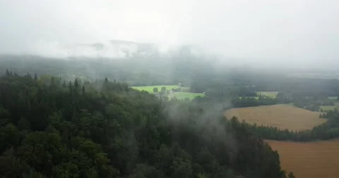 Flying drone over mountains and fields in Canada Video stock 204091402