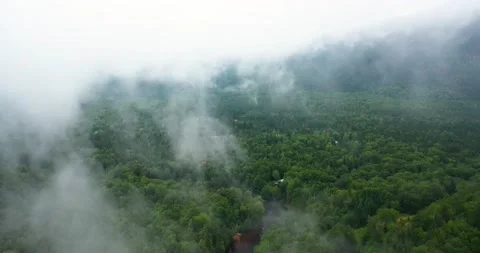 Flying drone over mountains and waterfalls in Canada Stock Footage 204091714