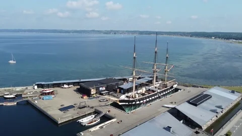 Flying with Drone over museum ship HDMS Jylland (wooden ship) in Ebeltoft and Stock Footage 162336850