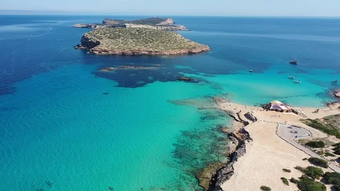 Flying with Drone over natural Beach and beautiful Coast of ibiza | 4K Video stock 110246358
