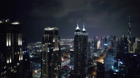 Flying a drone over a night Dubai. Aerial view Vídeos de archivo 209130890